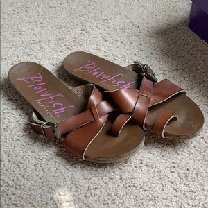 Blowfish sandal with toe strap and buckle